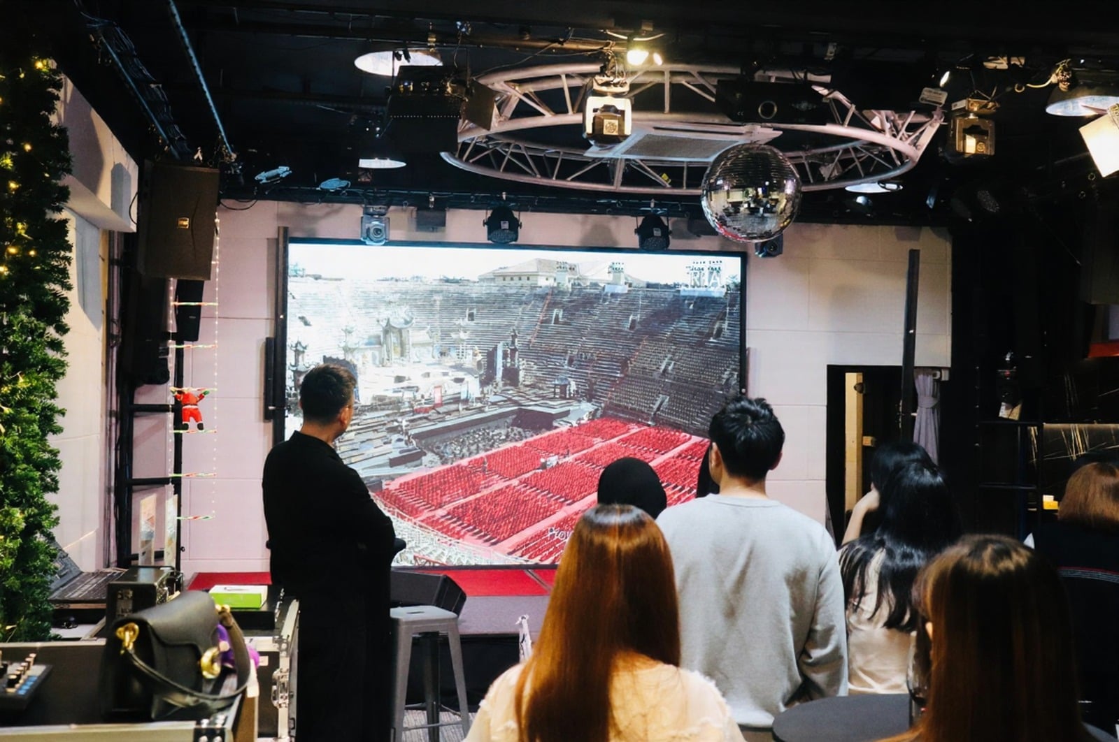 Consultation session reviewing architectural sound plans